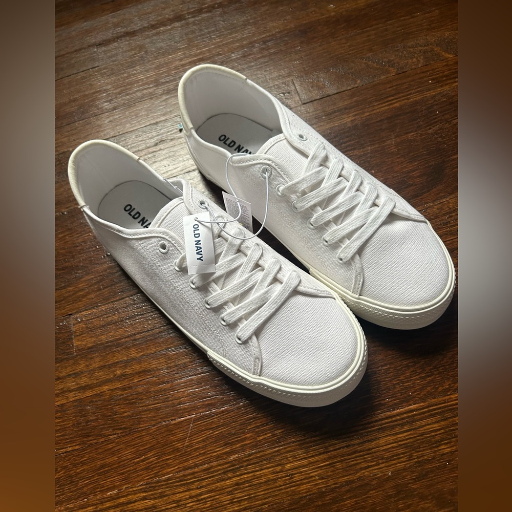 NWT Mens size 9 canvas sneakers. Never worn, purchased mens instead of womens.